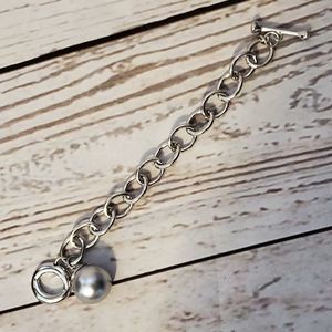 Silvertone bold chain toggle closure bracelet with gray faux pearl charm